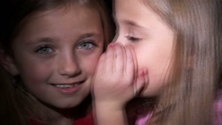 8-year-old-twins-whispering_wk1nzpdgb__S