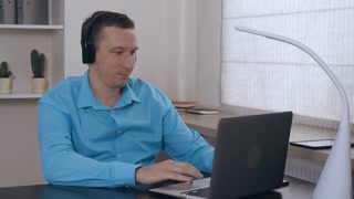 Image result for eyes closed, listening to music, looking at computer