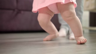 Little Baby Learning Walk On Floor Cute Baby Feet Learn To Walk