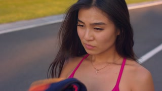 https://d2v9y0dukr6mq2.cloudfront.net/video/thumbnail/Vd3bj2jPe/videoblocks-tired-woman-wiping-face-with-towel-after-fitness-workout-closeup-of-sexy-asian-woman-exhausted-after-fitness-training-asian-girl-resting-after-running-outdoor-sensual-woman-breathing-hard_hdzzqbfag_thumbnail-small14.jpg